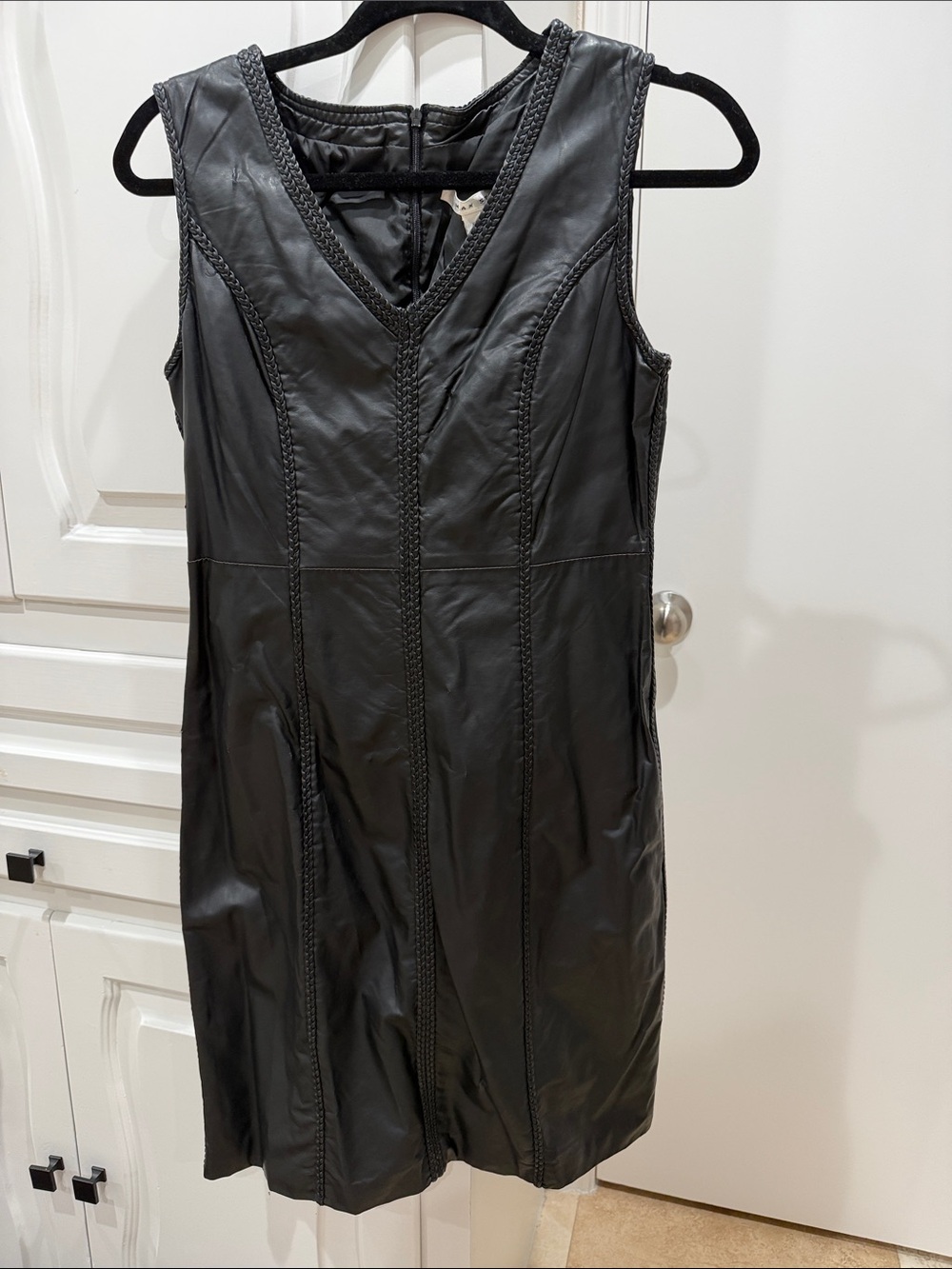 Leather-looking sleeveless vest